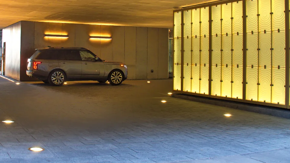 A car parked in a softly lit underground car park